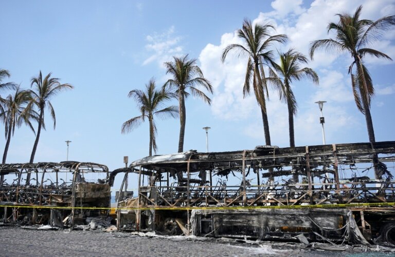 Des bus incendiés à Puerto Vallarta, dans l'Etat de Jalisco, au Mexique, le 23 février 2026 © ARTURO MONTERO