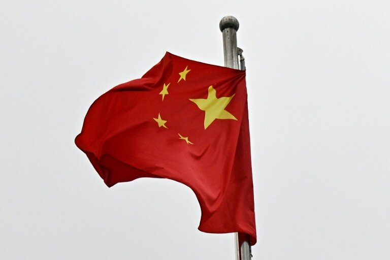 Un drapeau chinois flotte à Pékin, le 4 mars 2026 © Pedro PARDO