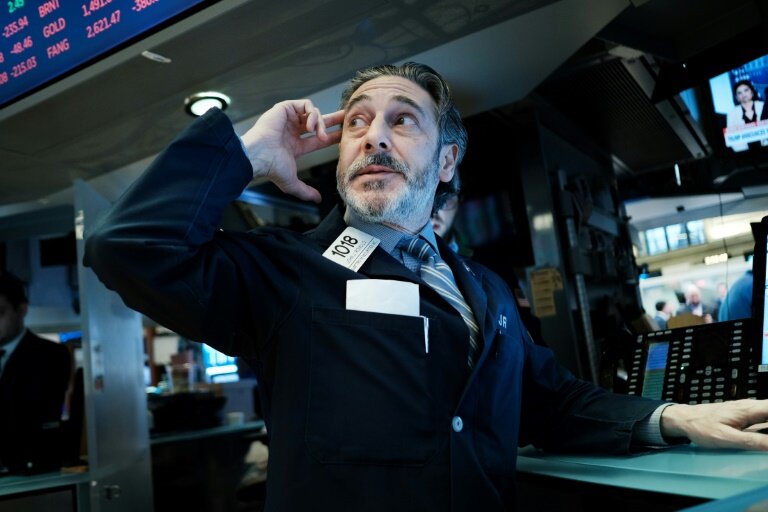Un opérateur du New York Stock Exchange © SPENCER PLATT