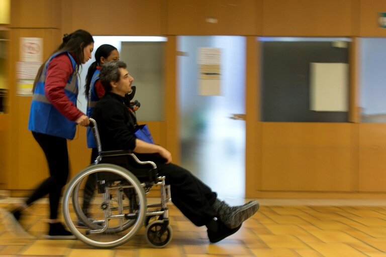 Une volontaire du service civique près de Paris, le 7 janvier 2016 © KENZO TRIBOUILLARD