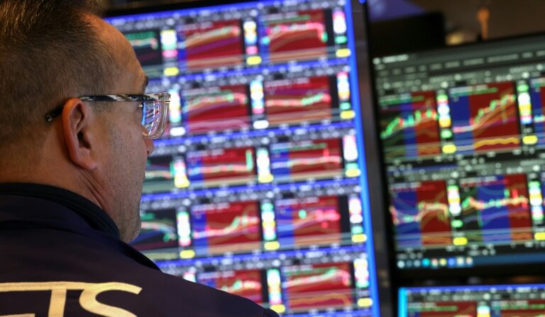 Un opérateur à la Bourse de New York, le 3 décembre 2025 © TIMOTHY A. CLARY