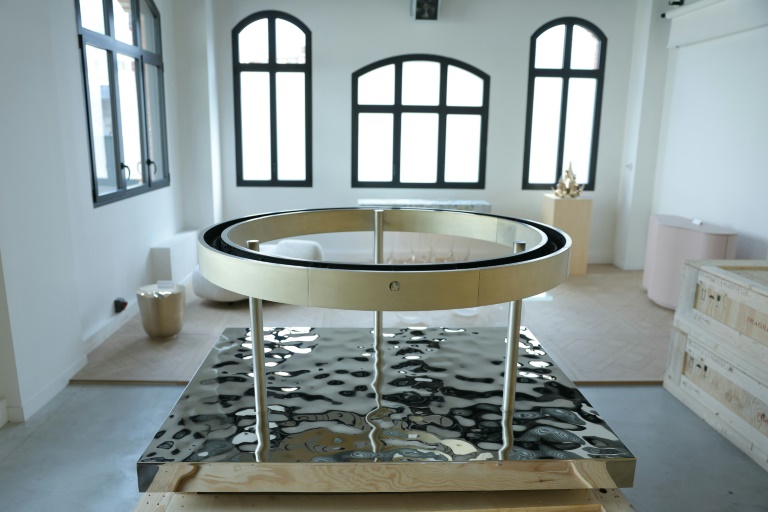 Pour le relais de la flamme olympique, des chaudrons en forme d'anneaux