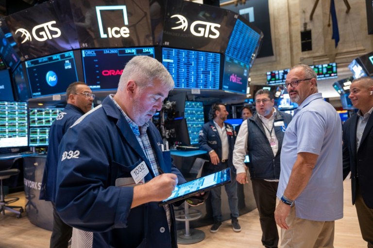 Wall Street en hausse, satisfaite par l'inflation et les résultats des banques