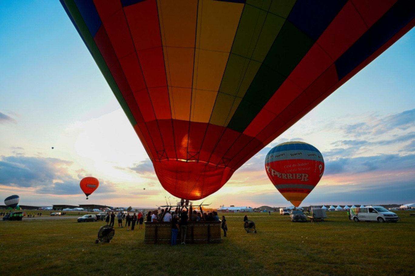 Des montgolfières décollent pour le premier jour du Mondial Air Ballon, le 21 juillet 2023 à Hagéville, en Meurthe-et-Moselle © Jean-Christophe VERHAEGEN