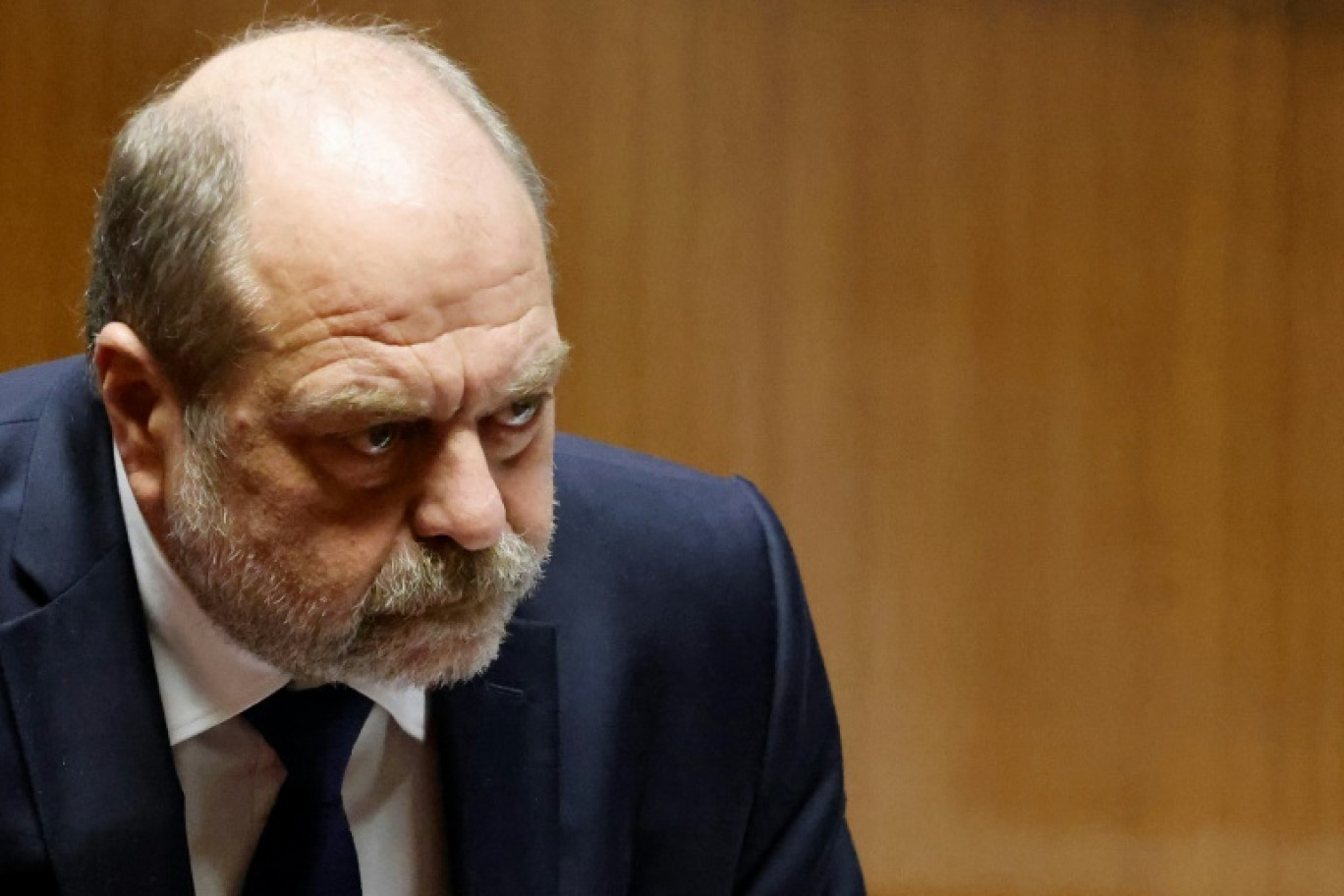 Le ministre français de la Justice, Eric Dupond-Moretti, assiste à une séance de questions au gouvernement à l'Assemblée nationale à Paris, le 28 novembre 2023 © Ludovic MARIN