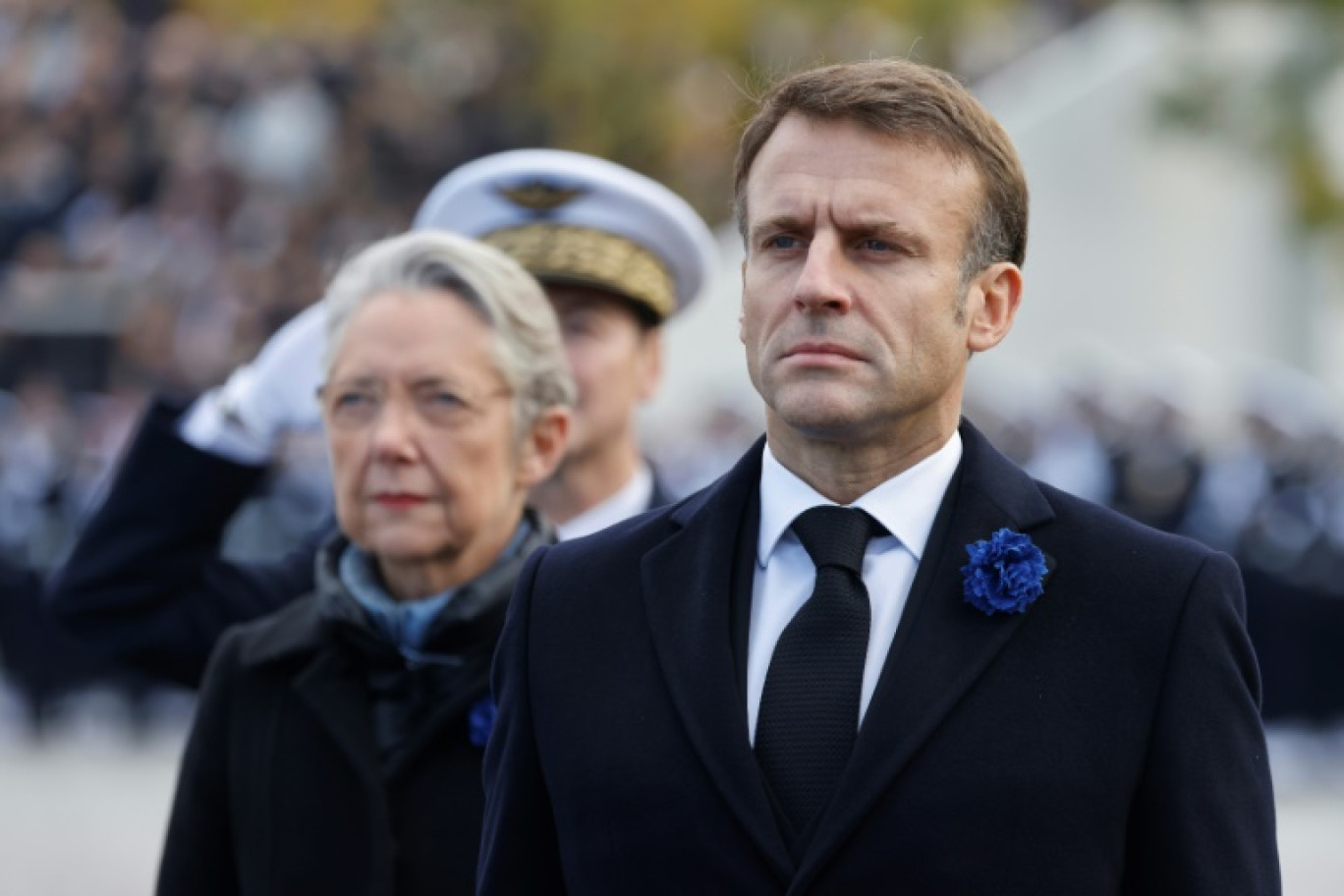 Emmanuel Macron et Elisabeth Borne à la cérémonie du 11-Novembre à l'Arc de Triomphe à Paris en 2023 © Ludovic MARIN