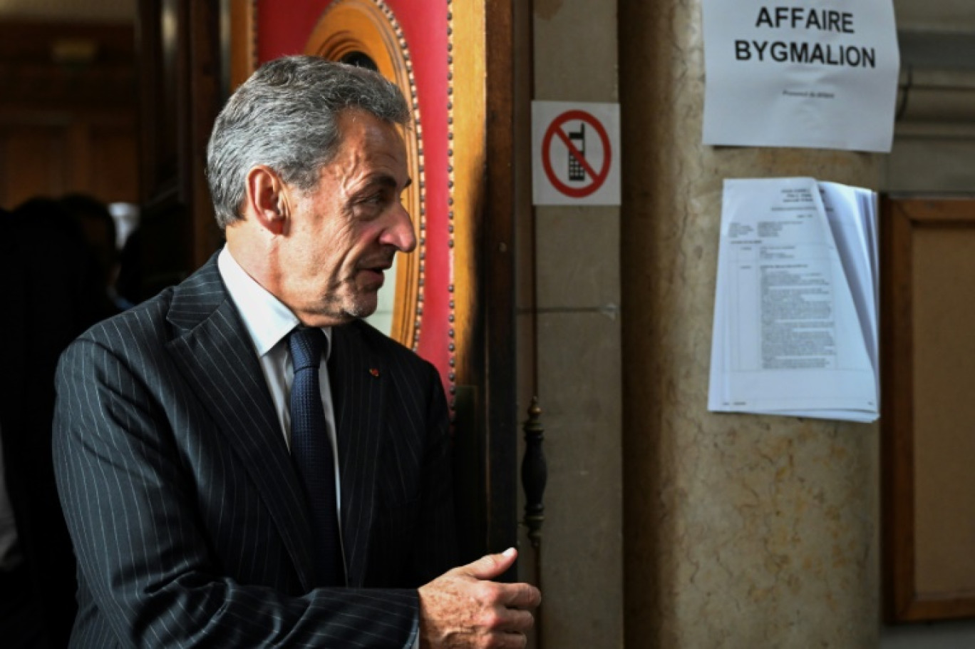 L'ancien président Nicolas Sarkozy quitte le tribunal, le 14 février 2024 © Bertrand GUAY