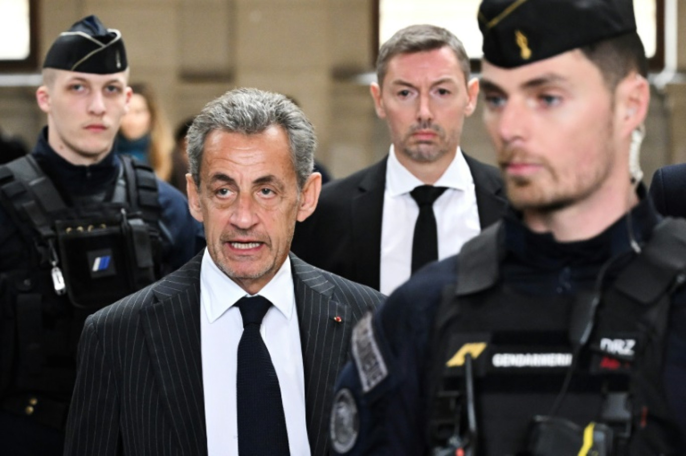 L'ancien président Nicolas Sarkozy à son arrivée au tribunal le 14 février 2024 © Bertrand GUAY