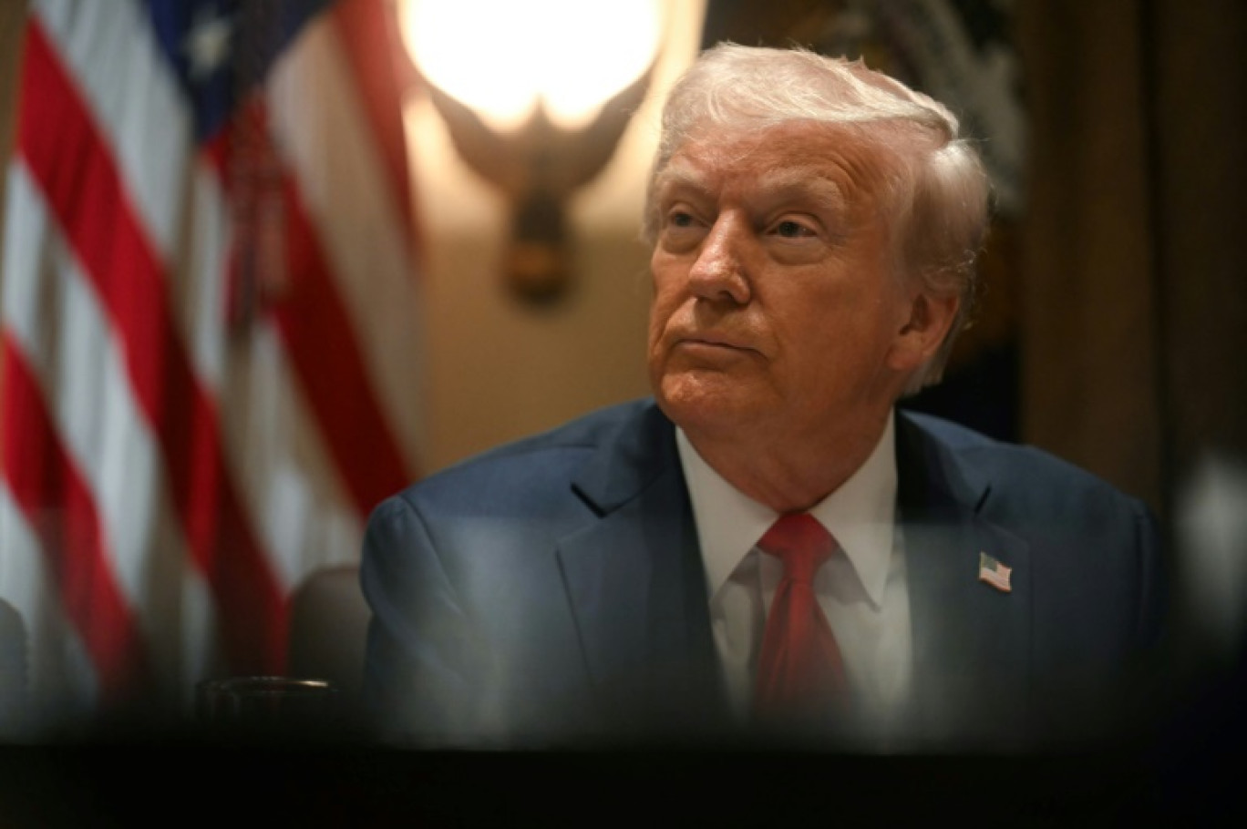 Le président américain Donald Trump lors d'une réunion du cabinet à la Maison Blanche, le 26 février 2025 à Washington © Jim WATSON