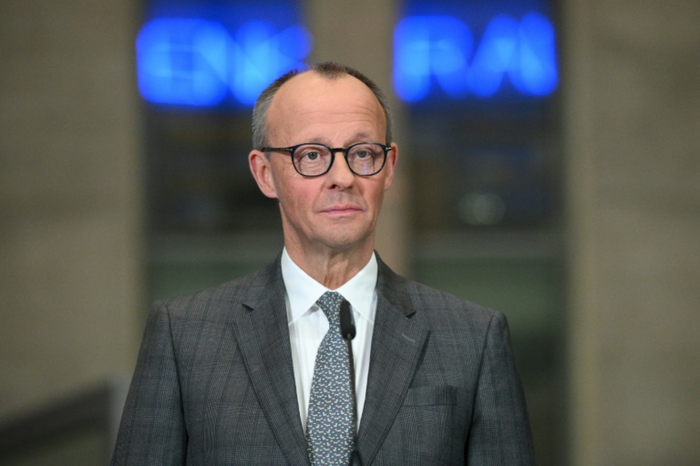 Le futur chancelier allemand Friedrich Merz, lors d'une conférence de presse présentant son plan d'investissements, le 4 mars 2025 à Berlin © RALF HIRSCHBERGER
