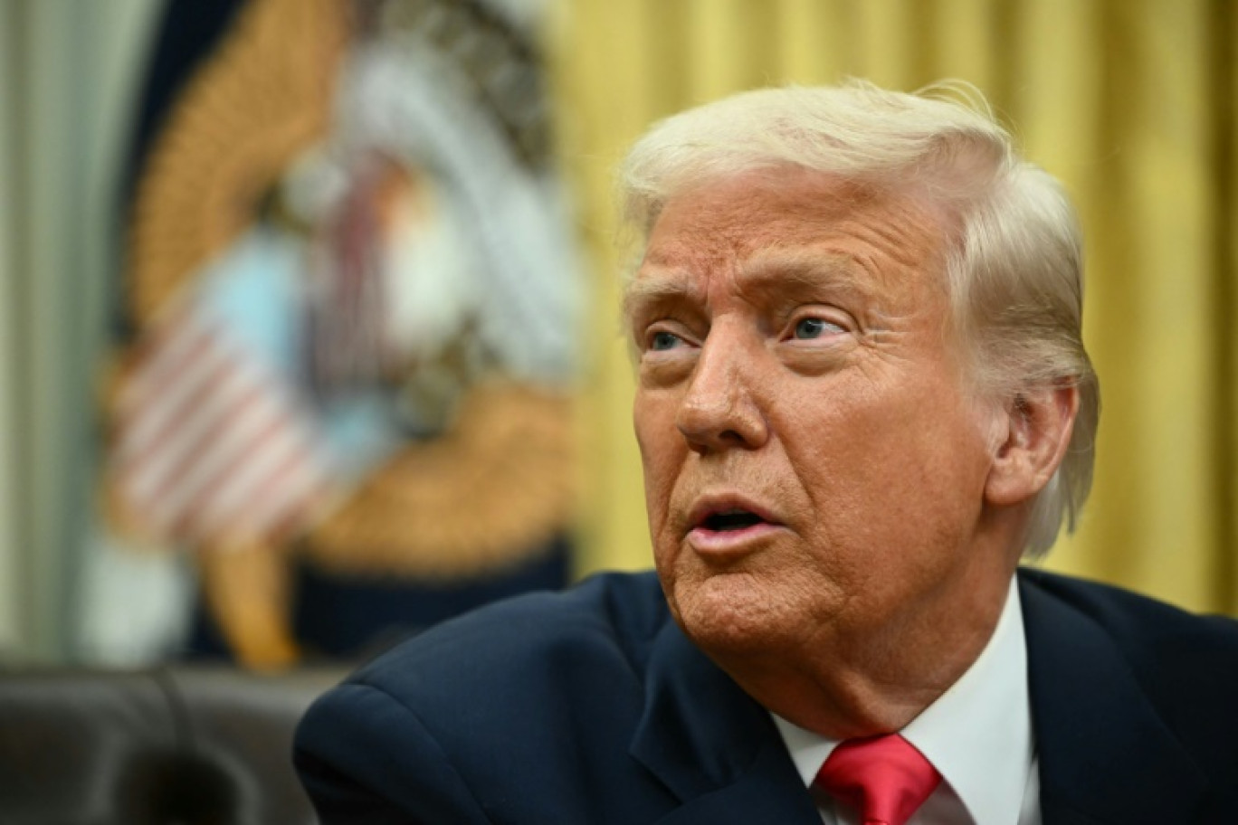 Le président américain Donald Trump a justifié vendredi son recul sur les droits de douane contre le Canada et le Mexique par sa volonté d'"aider" les deux voisins des Etat-Unis © Mandel NGAN