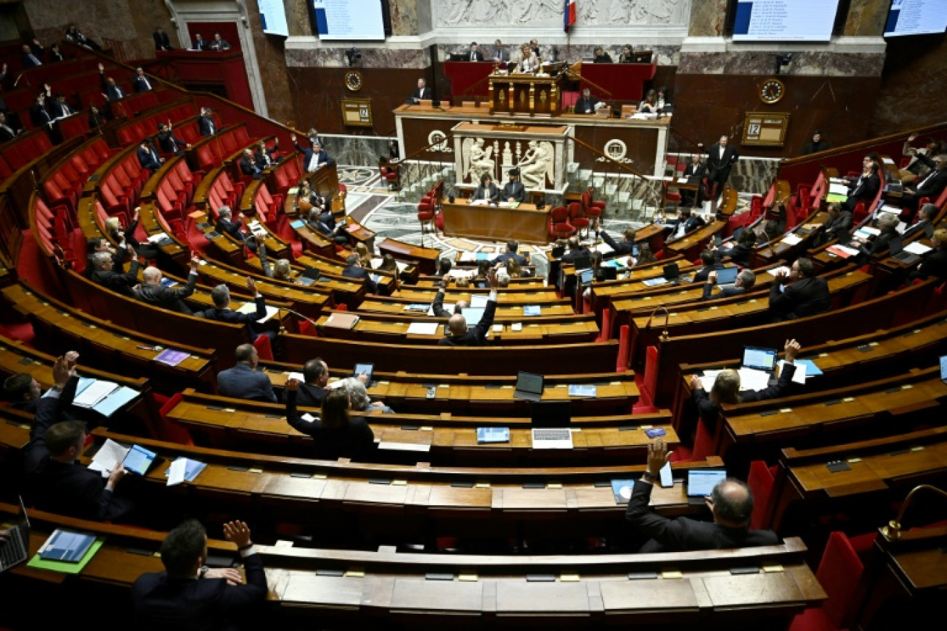 Des députés à l'Assemblée nationale à Paris, le 12 mars 2025 © JULIEN DE ROSA