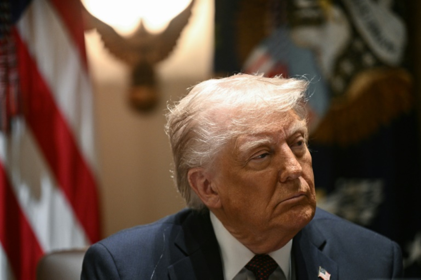 Le président américain Donald Trump à la Maison Blanche à Washington, le 24 mars 2025 © Brendan SMIALOWSKI