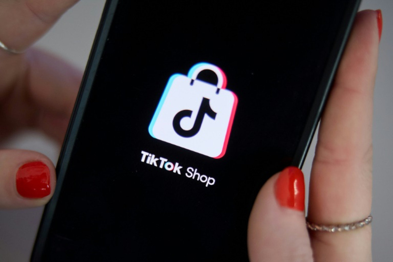 Le logo de Tik Tok Shop sur un iPhone, le 15 mars 2025 à Paris. © Kiran RIDLEY