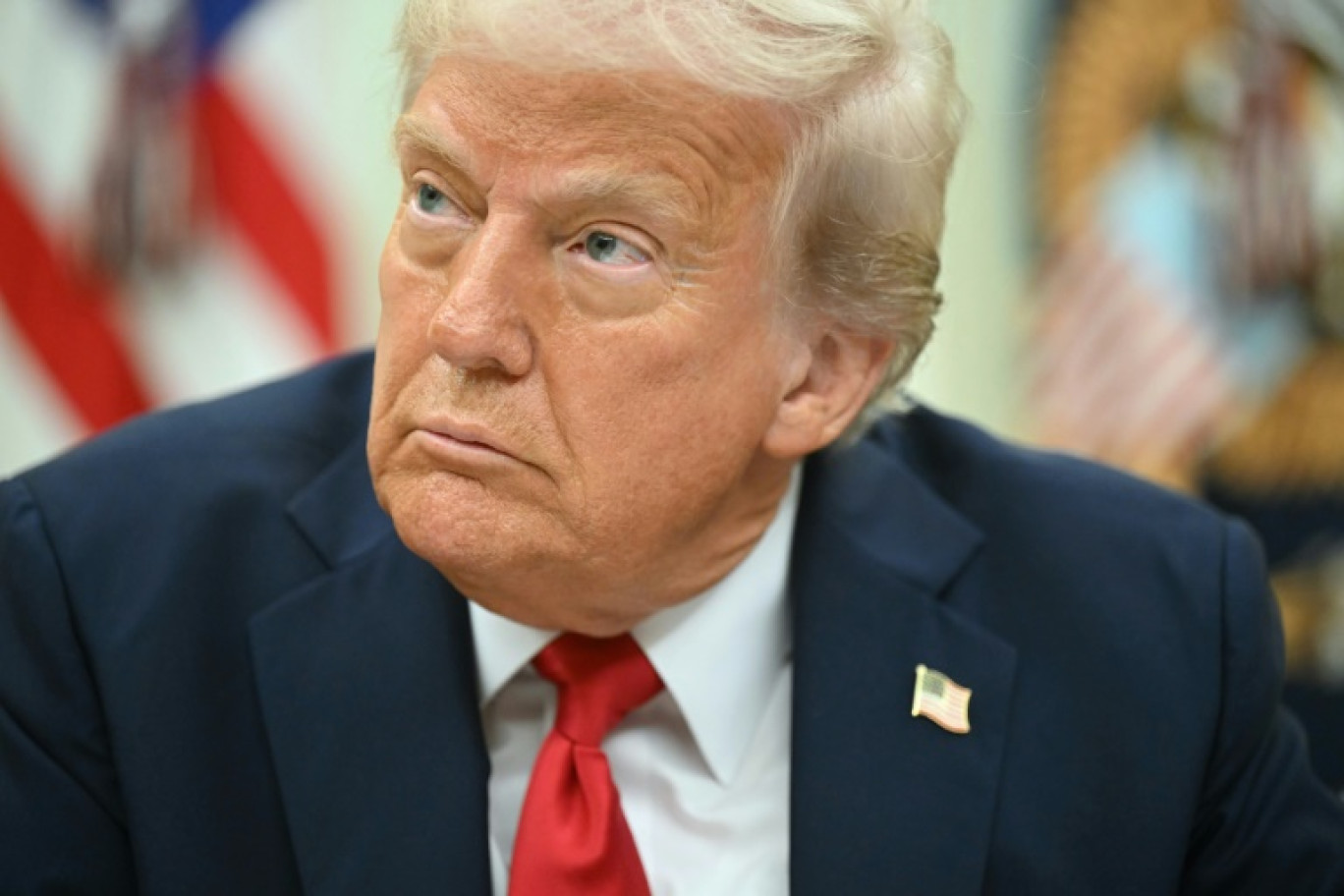 Le président américain Donald Trump présente un décret signé sur les droits de douane, le 2 avril 2025 à la Maison Blanche, à Washington © SAUL LOEB