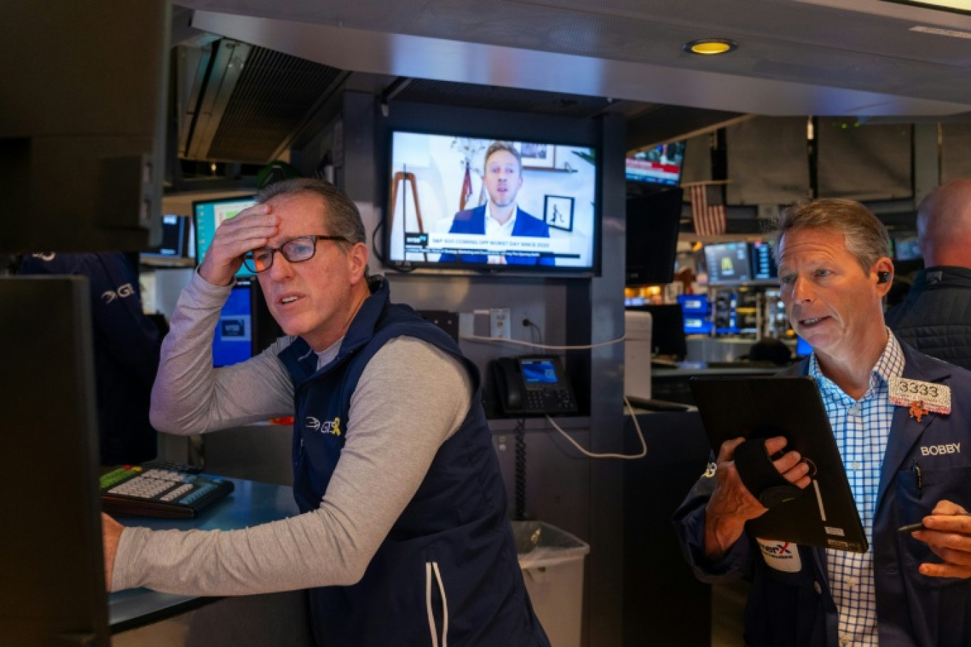 Traders à Wall Street, sur le parquet de la Bourse de New York le 4 avril 2025 © SPENCER PLATT