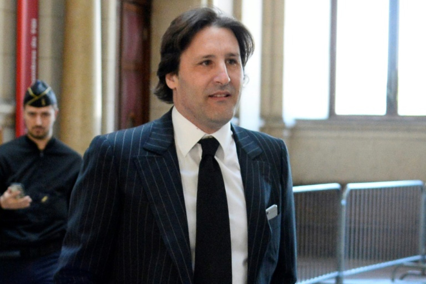 Arnaud Mimran arrive au tribunal pour le procès de l'escroquerie à la taxe carbone, le 25 mai 2016 à Paris © BERTRAND GUAY