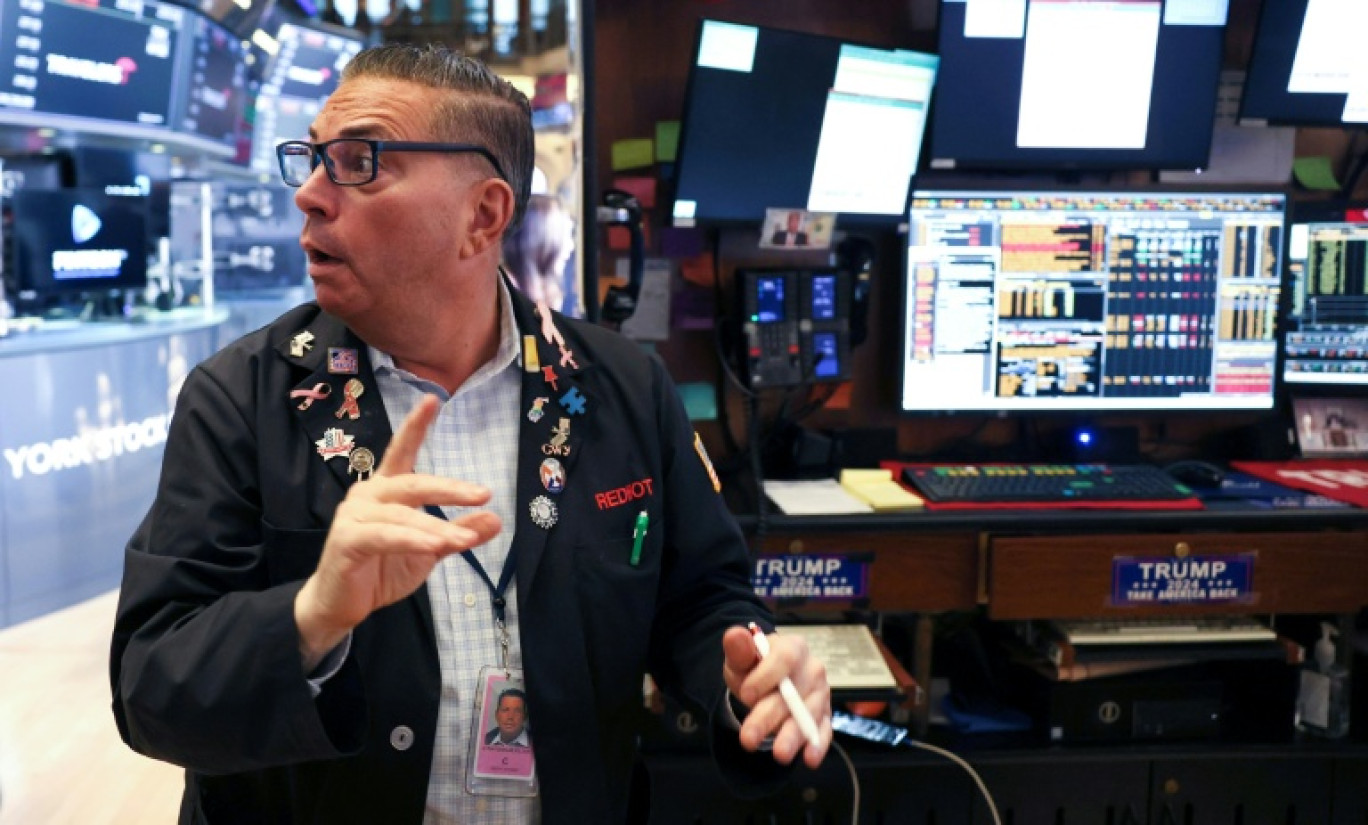 Trader sur le parquet du New York Stock Exchange (NYSE). © TIMOTHY A. CLARY
