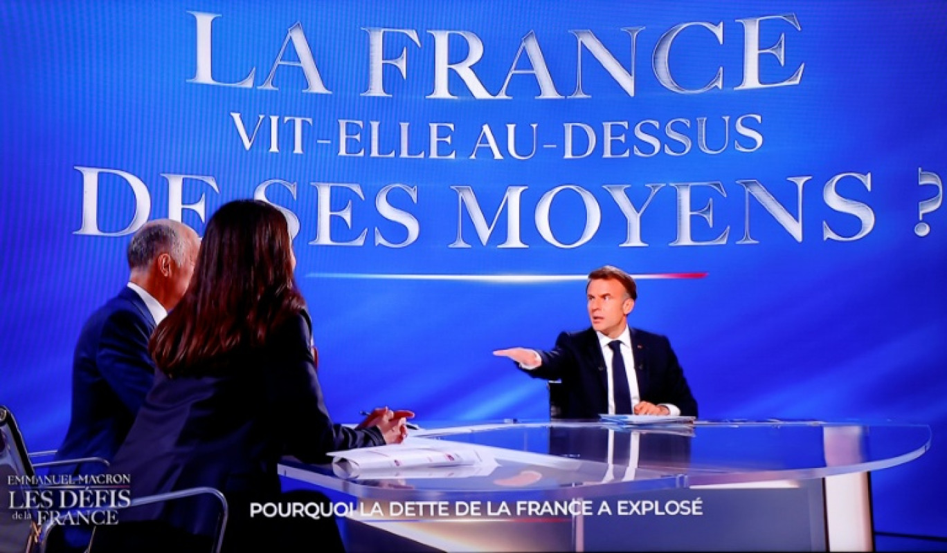 Emmanuel Macron interrogé sur le plateau de TF1 le 13 mai 2025 © Ludovic MARIN