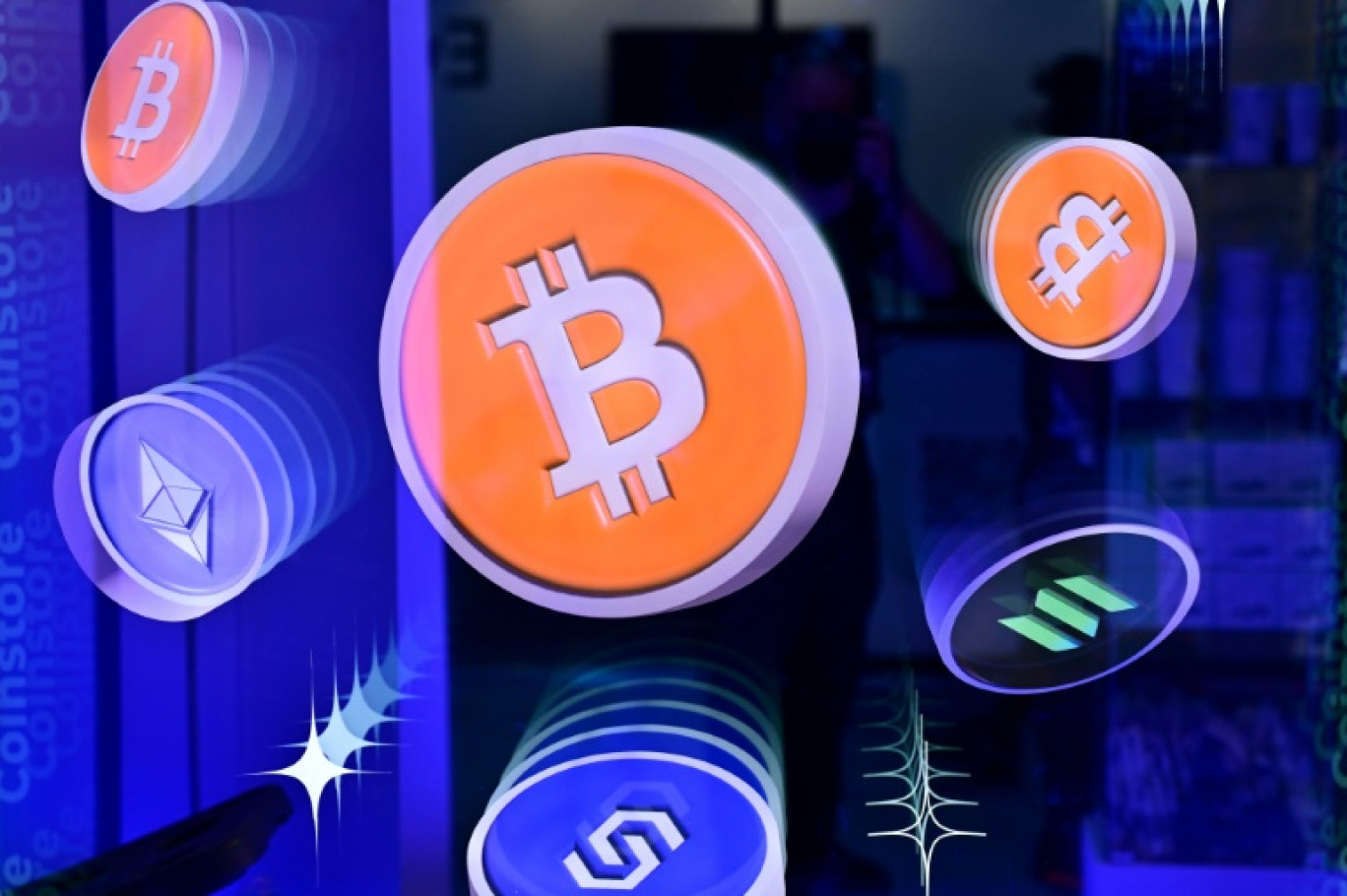 Logos du bitcoin et d'autres crypto-monnaies. © Giuseppe CACACE