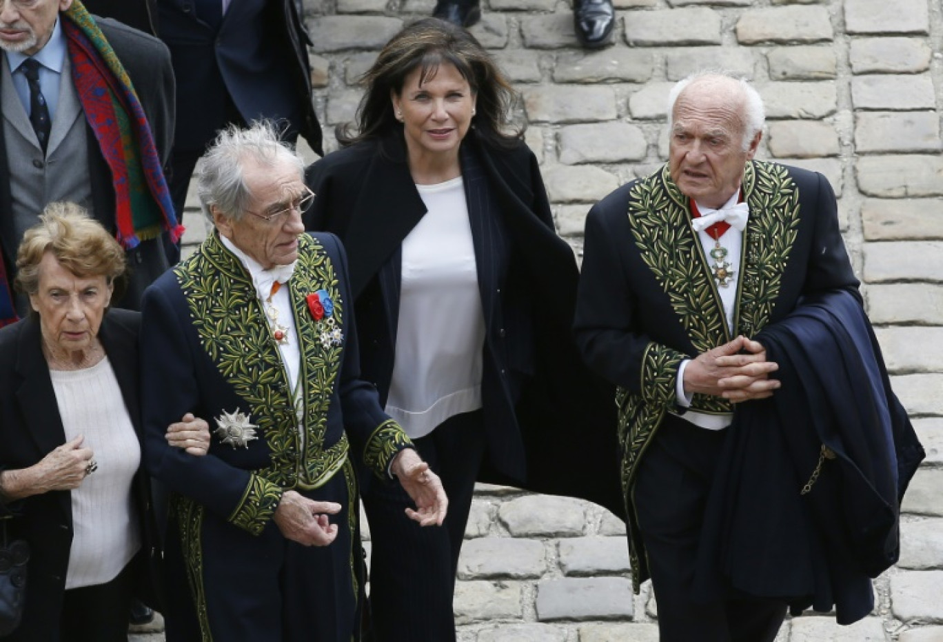 Anne Sinclair et Pierre Nora (d) aux obsèques d'Alain Decaux le 4 avril 2016 à Paris. © PATRICK KOVARIK