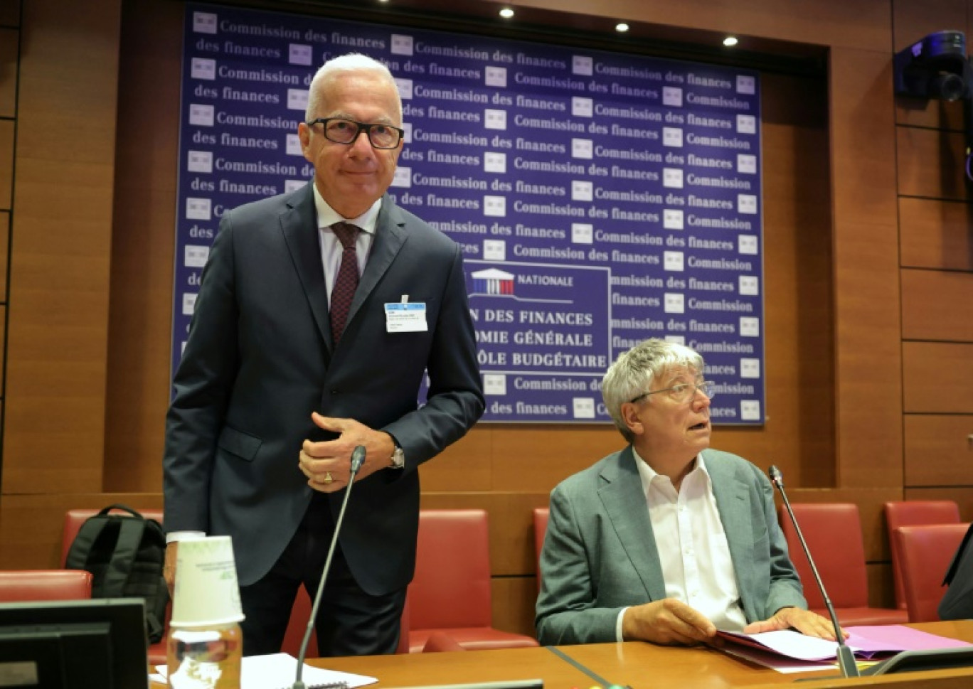 Le président d'ArcelorMittal France, Alain Le Grix de la Salle (G) lors de son audition devant la Commission des Finances de l'Assemblée nationale le 9 aout 2025 à Paris. © Thomas SAMSON