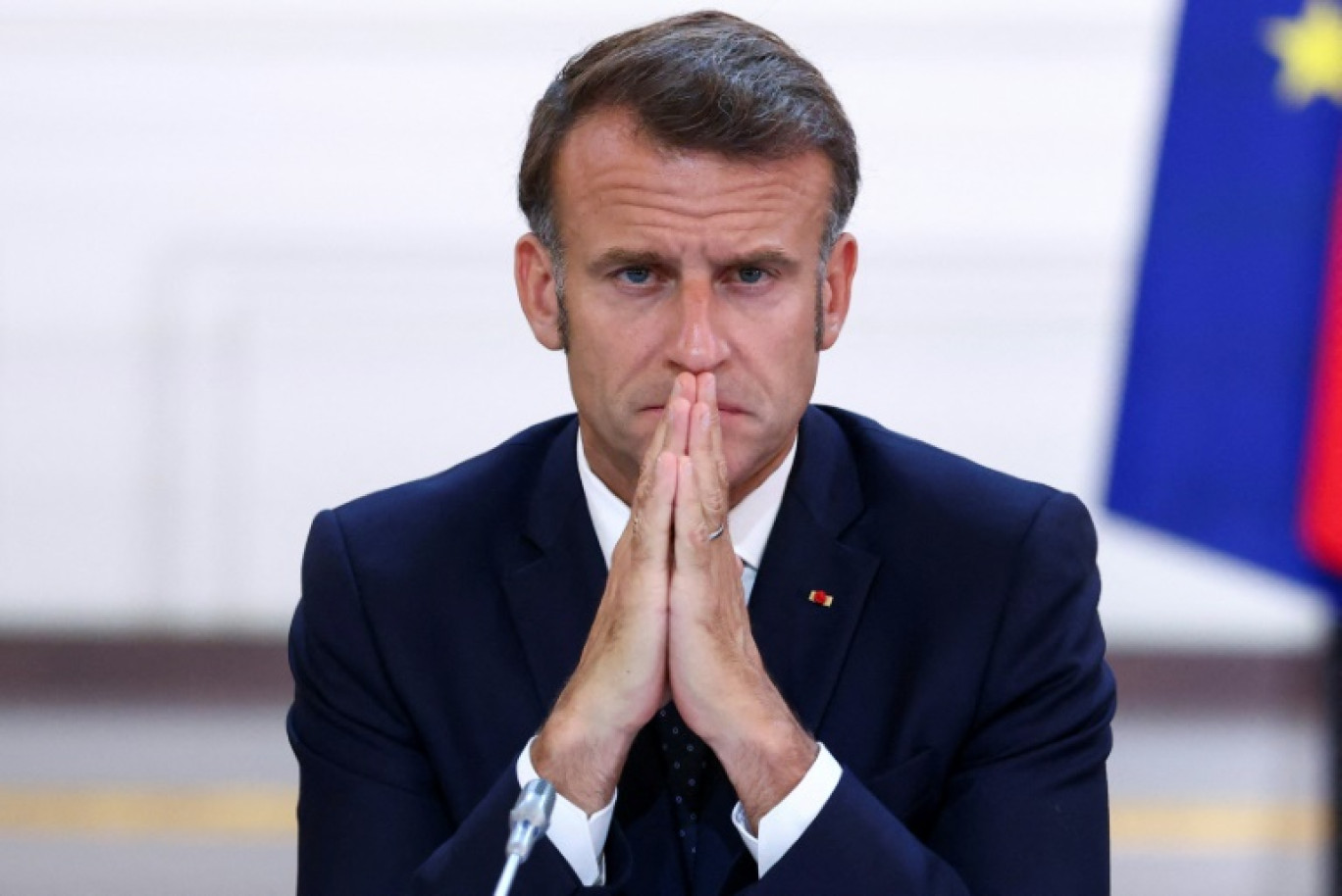 Le président français Emmanuel Macron participe à une réunion au palais de l'Elysée, à Paris, le 12 juillet 2025 © Tom Nicholson