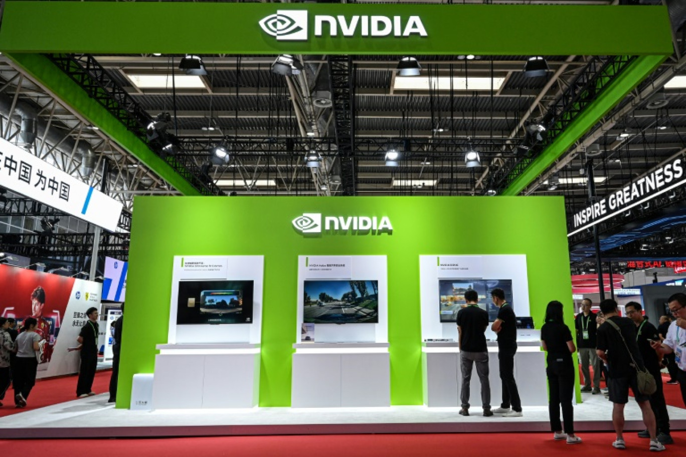 Le PDG de Nvidia, Jensen Huang, s'adresse aux journalistes à son arrivée à une conférence de presse dans un hôtel de Pékin, le 16 juillet 2025 © Adek BERRY