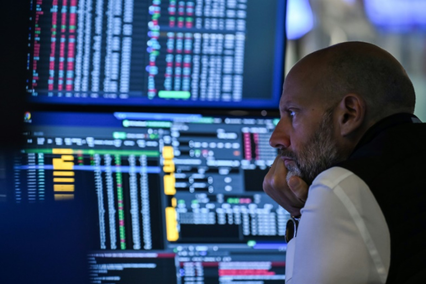Un opérateur à la Bourse de New York, le 18 juillet 2025 © ANGELA WEISS