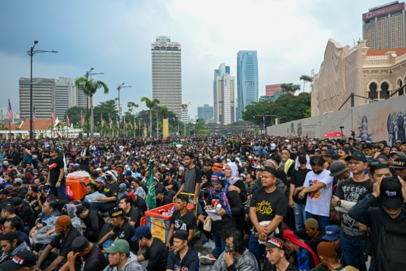 Manifestation contre l'augmentation du coût de la vie et le manque de réformes imputés au gouvernement du Premier ministre malaisie Anwar Ibrahim, le 26 juillet  à Kuala Lumpur © Mohd RASFAN
