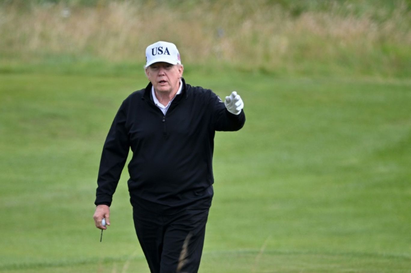 Le président américain Donald Trump joue au glof à Turnberry en Ecosse, le 26 juillet 2025 © ANDY BUCHANAN