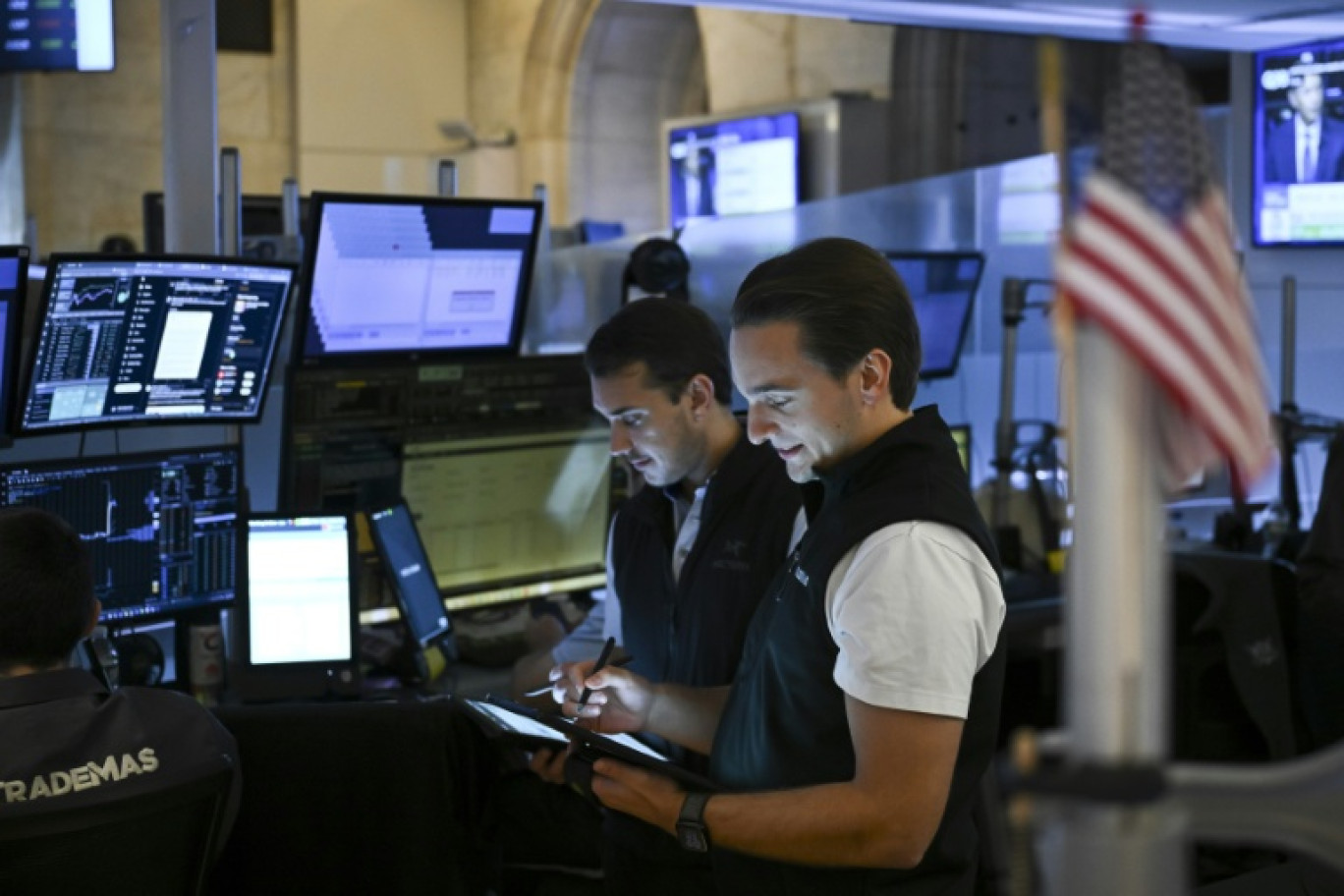 Des opérateurs à la Bourse de New York le 18 juillet 2025 © ANGELA WEISS