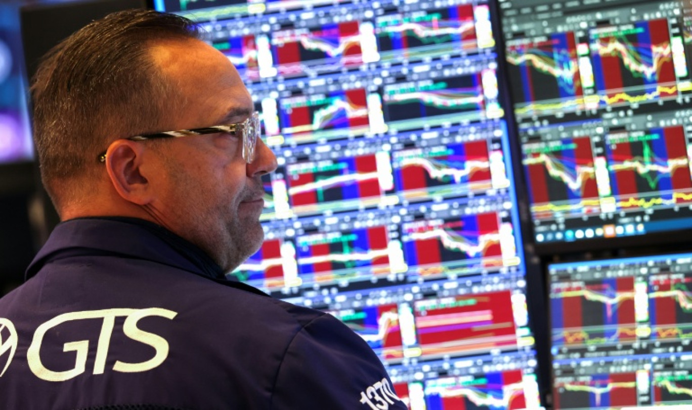 Un opérateur à la Bourse de New York, le 13 octobre 2025 © TIMOTHY A. CLARY