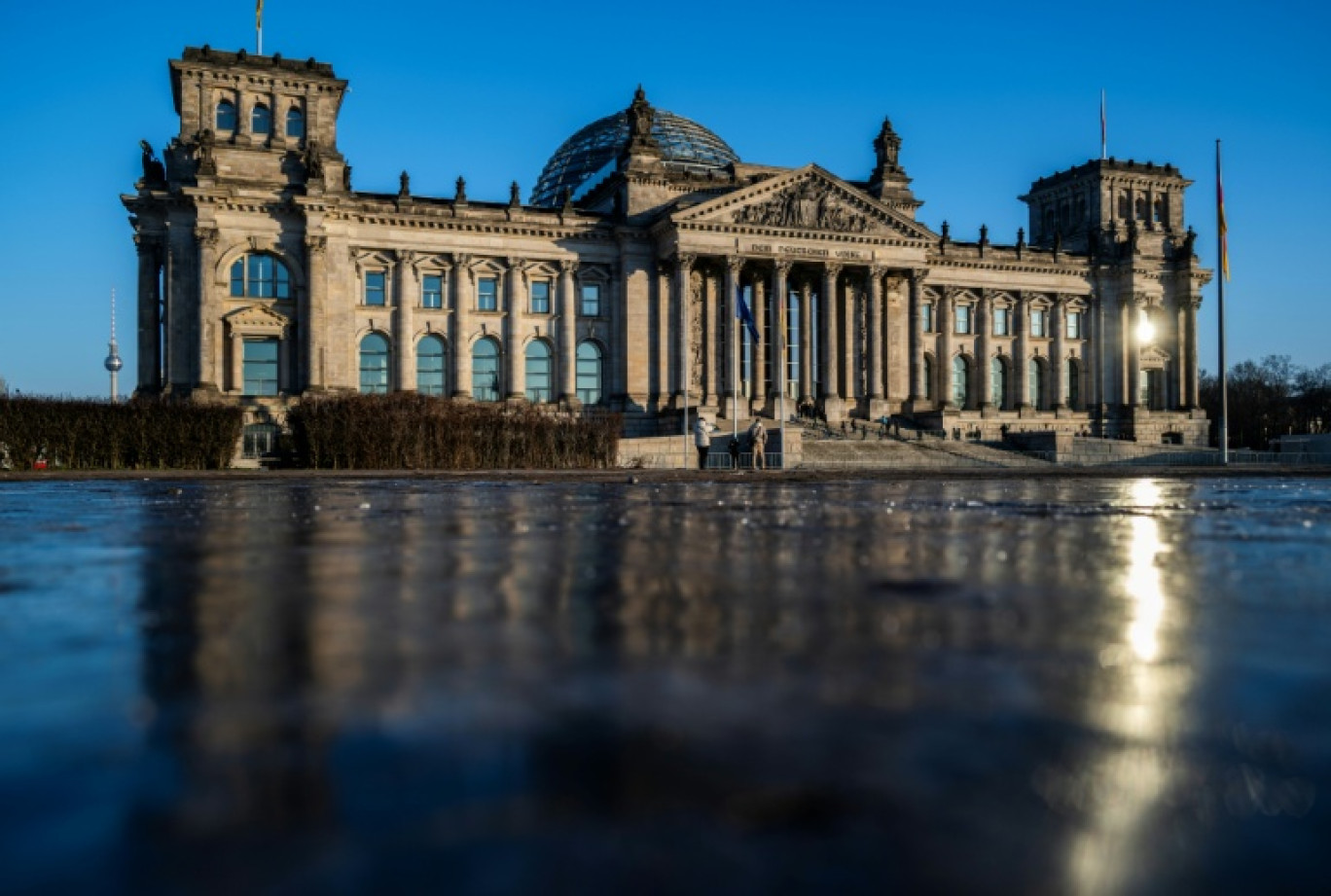Le bâtiment du Reichstag, qui abrite la chambre basse du Parlement allemand (Bundestag), à Berlin, le 21 janvier 2026 © John MACDOUGALL