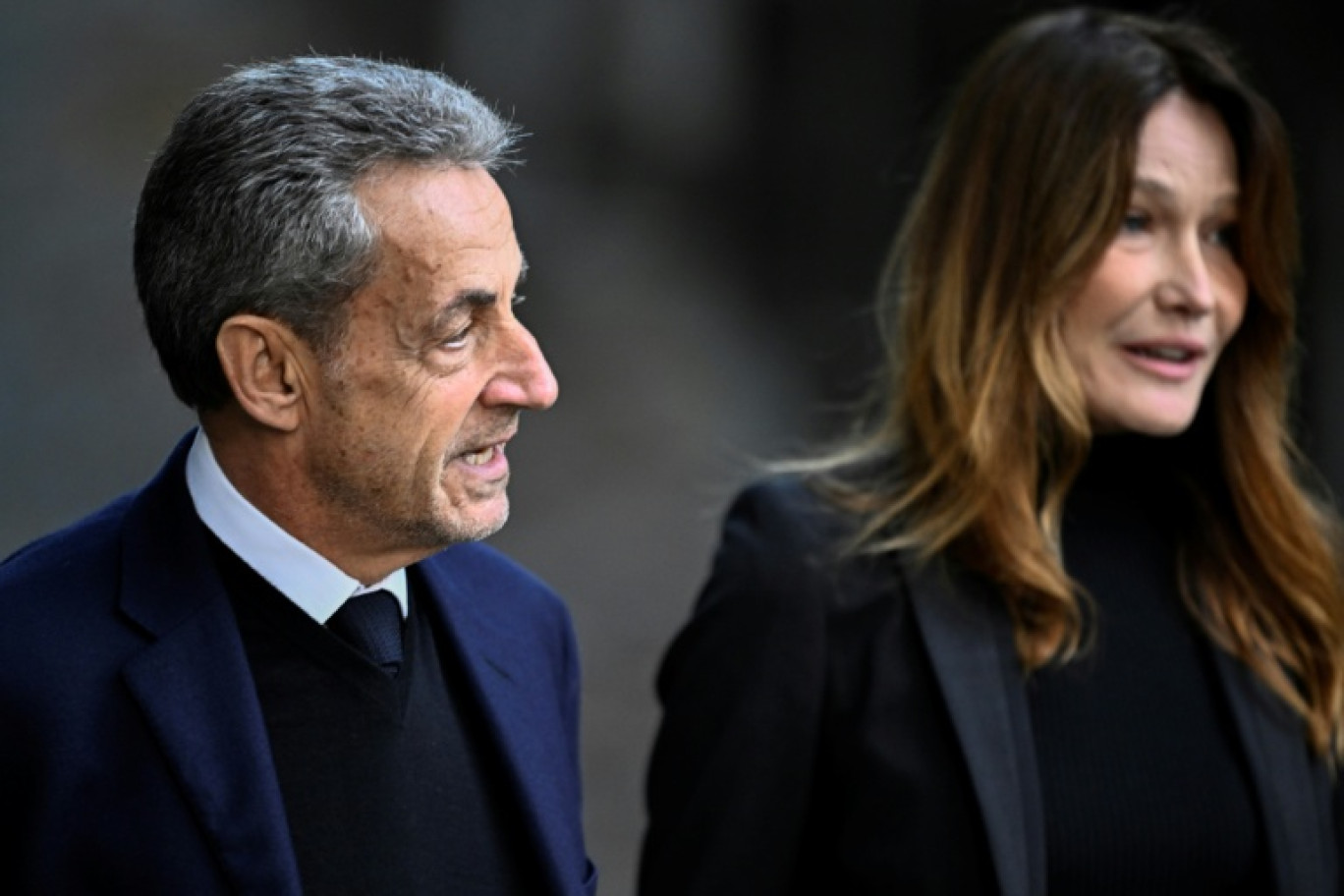 L'ancien président Nicolas Sarkozy et son épouse Carla Bruni-Sarkozy, le 21 octobre 2025 à Paris © JULIEN DE ROSA