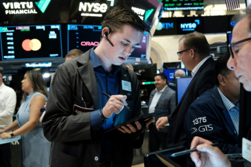 Wall Street réagit peu à la hausse des taux de la Fed