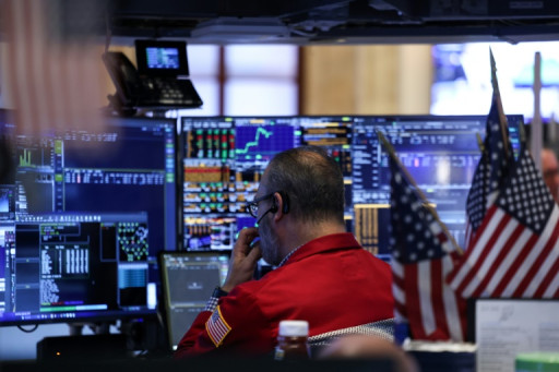 Wall Street termine sans direction claire, fait une pause avant la Fed